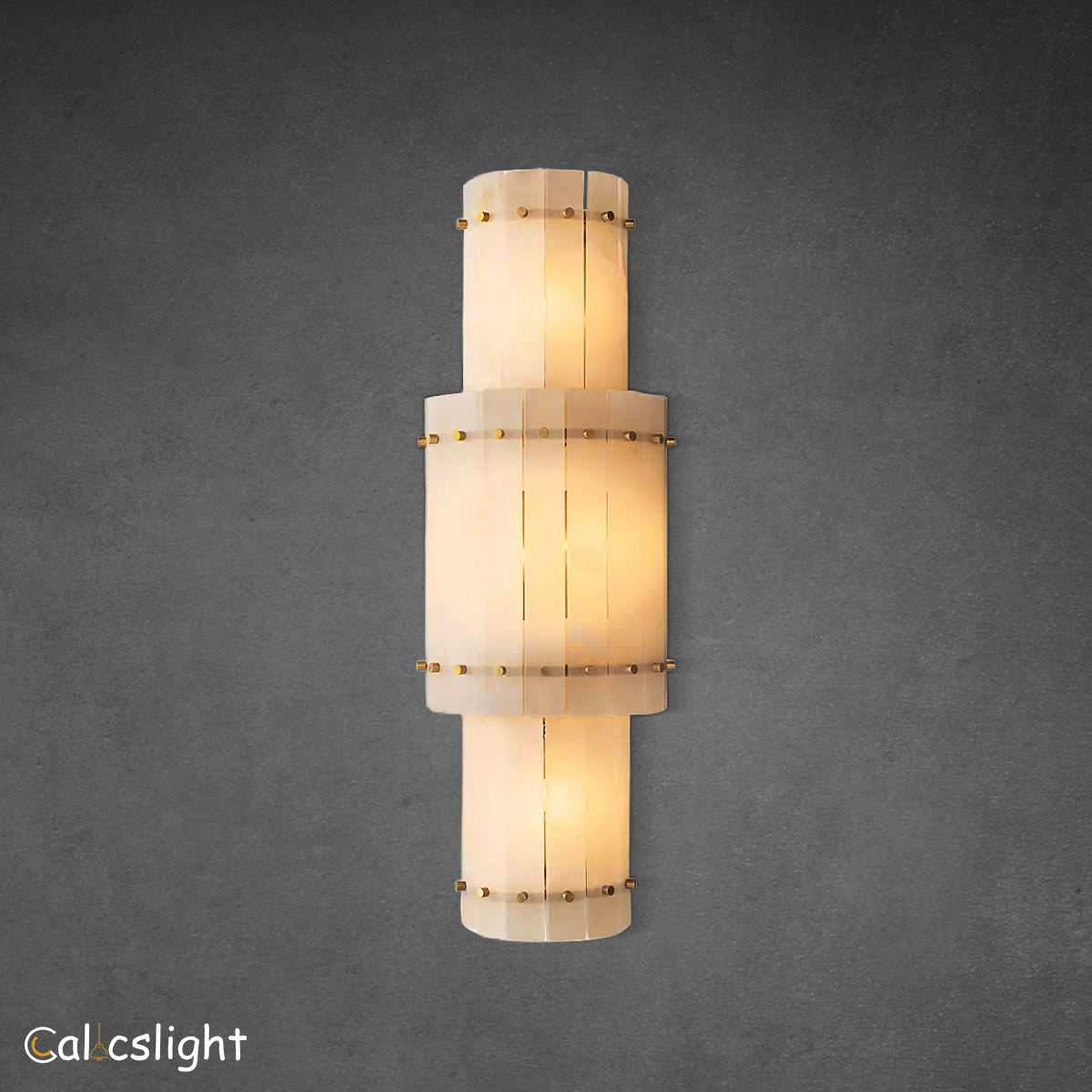 An elegant San Marco Alabaster Grand Round Sconce with a soft, natural texture, diffusing light to create a warm ambiance.