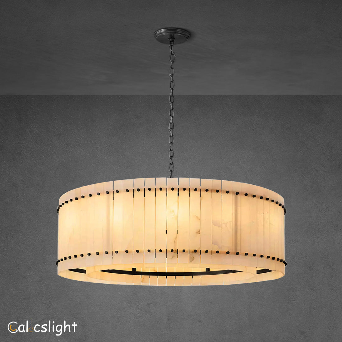 A round San Marco Alabaster chandelier with a metallic frame and alabaster panels, hanging from a ceiling fitter.