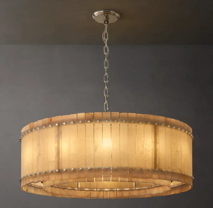 A round San Marco Alabaster chandelier with a metallic frame and alabaster panels, hanging from a ceiling fitter.
