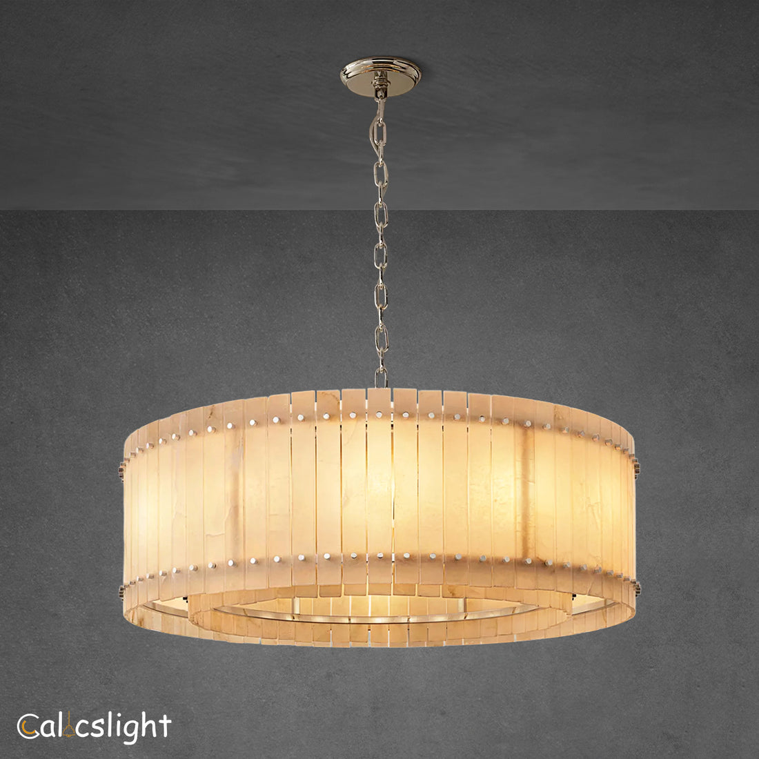 A round San Marco Alabaster chandelier with a metallic frame and alabaster panels, hanging from a ceiling fitter.