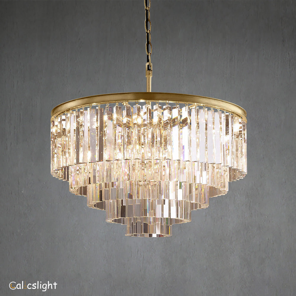 A luxurious multi-layered round chandelier with transparent crystals and a gold-colored metal frame, designed for indoor use